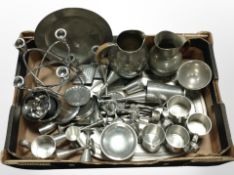 A box of stainless steel and pewter wares including mugs, candle holders, jugs, etc.