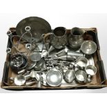 A box of stainless steel and pewter wares including mugs, candle holders, jugs, etc.