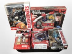 Five Hasbro Transformers figures, boxed, with a further Basic Fun Transformer figure set.