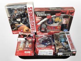 Five Hasbro Transformers figures, boxed, with a further Basic Fun Transformer figure set.
