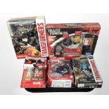 Five Hasbro Transformers figures, boxed, with a further Basic Fun Transformer figure set.