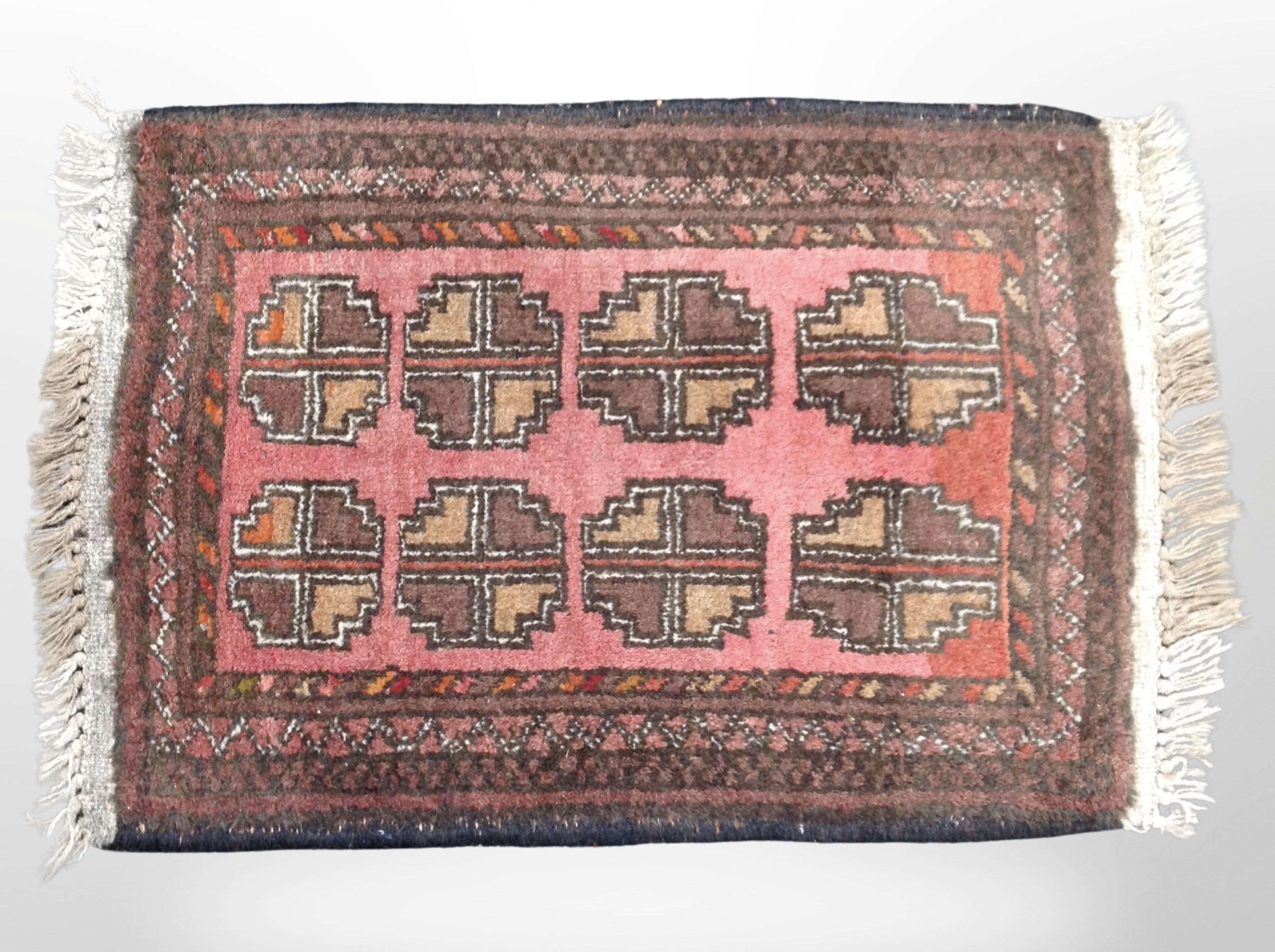 A Bokhara rug, Afghanistan, 77cm x 50cm.