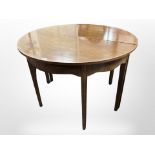 A 19th-century mahogany circular extending dining table, diameter 107cm.