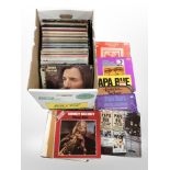 A box of vinyl LP records including classical, The Beatles, soundtracks, etc.