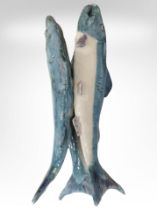 A studio pottery group of three fish, height 42cm.