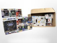 A collection of Funko Pop figures including large Marvel Avengers Thanos, The Riddler,