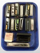 A group of harmonicas including Tombo, Stagg, etc.