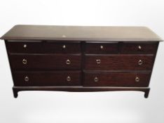 A Stag eight-drawer low chest, 156cm wide x 47cm deep x 71cm high.