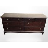 A Stag eight-drawer low chest, 156cm wide x 47cm deep x 71cm high.