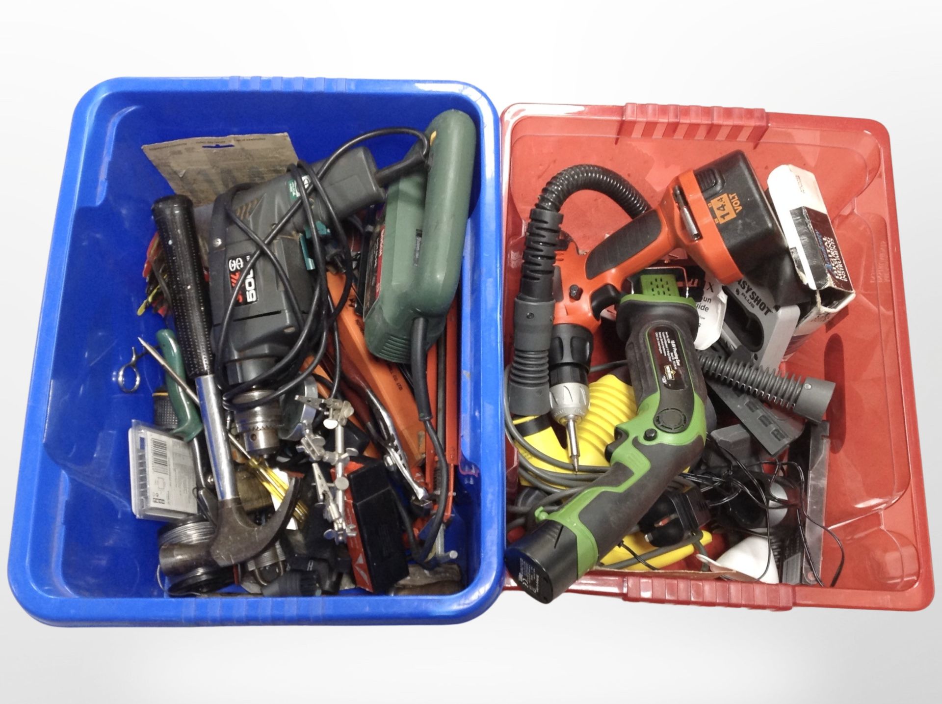 Two boxes of various power tools and hand tools.