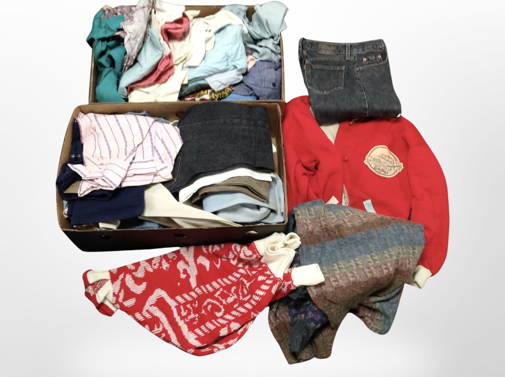 Two boxes of assorted clothing, jeans, knitted woollen jumpers, etc.