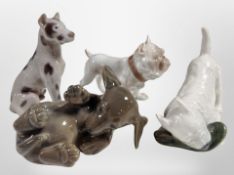 Four Bing and Grøndahl/Royal Copenhagen dogs, tallest 11cm.