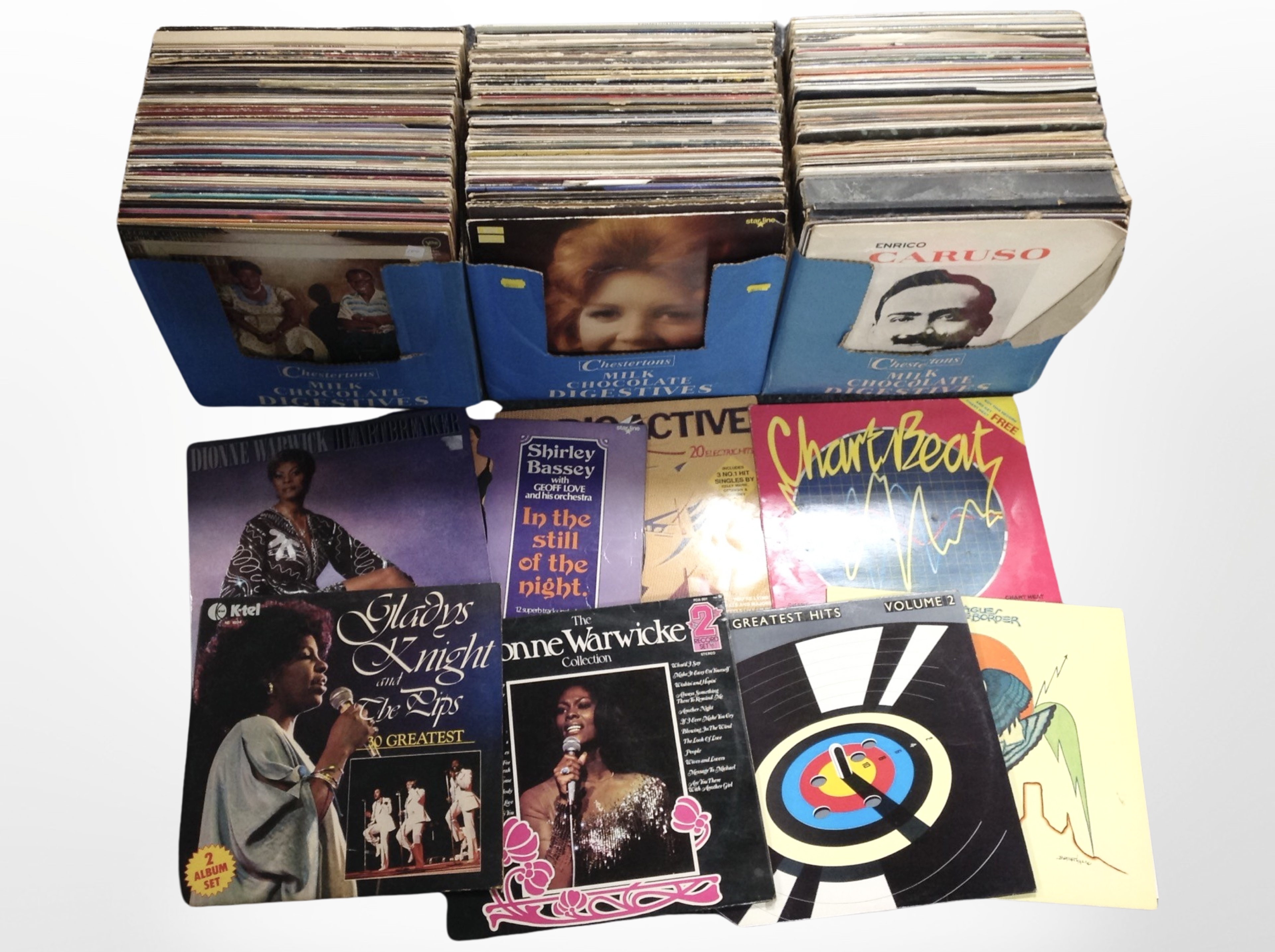 Three boxes of assorted LP records including Eurythmics, Shirley Bassey, Rick Astley,