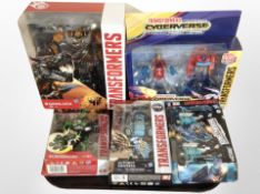 Five Hasbro Transformers figures, boxed.