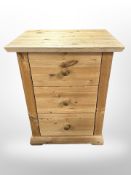 A contemporary pine three-drawer chest, 58cm wide x 44cm deep x 74cm high.