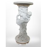A ceramic pedestal jardiniere stand with white marble top, height 67cm.