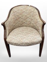 A carved mahogany-framed armchair in floral tapestry fabric, width 62cm.