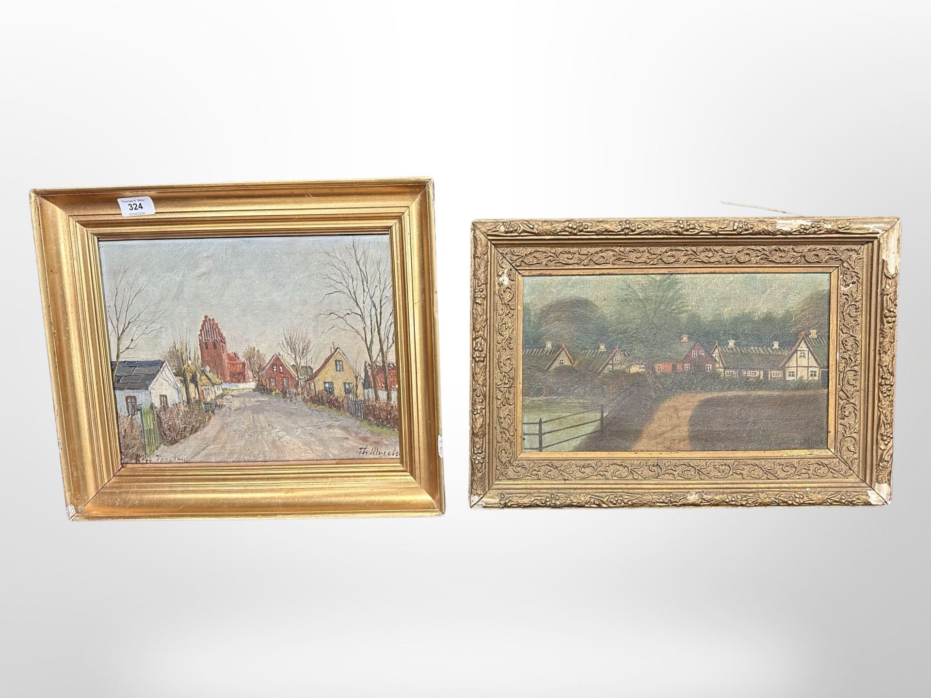 Two continental oil paintings depicting buildings, largest 33cm x 26cm.