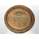 A ceramic Tuborg circular wall plaque, diameter 39cm.