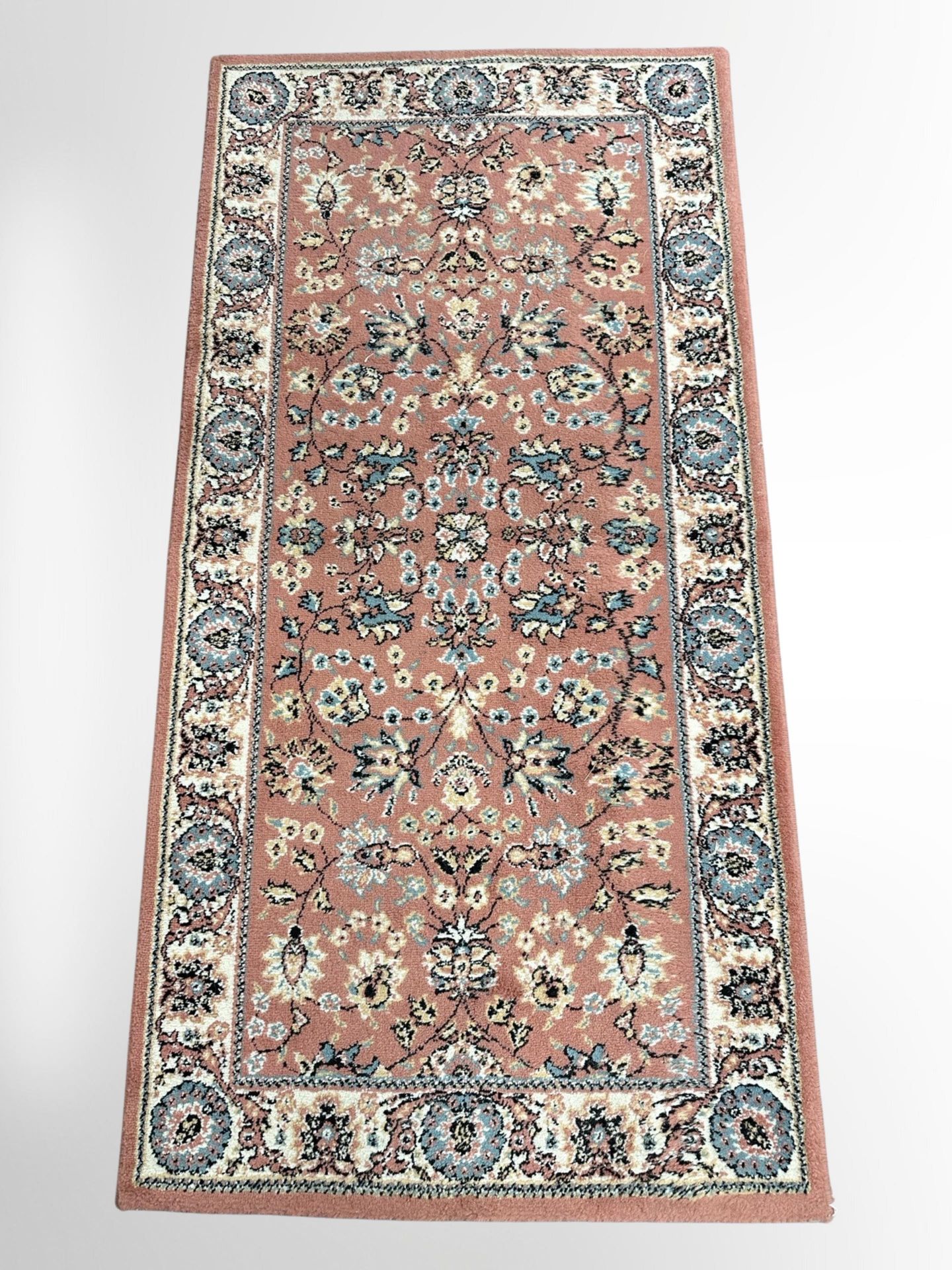 A machine-made rug of Iranian Saroukh design,