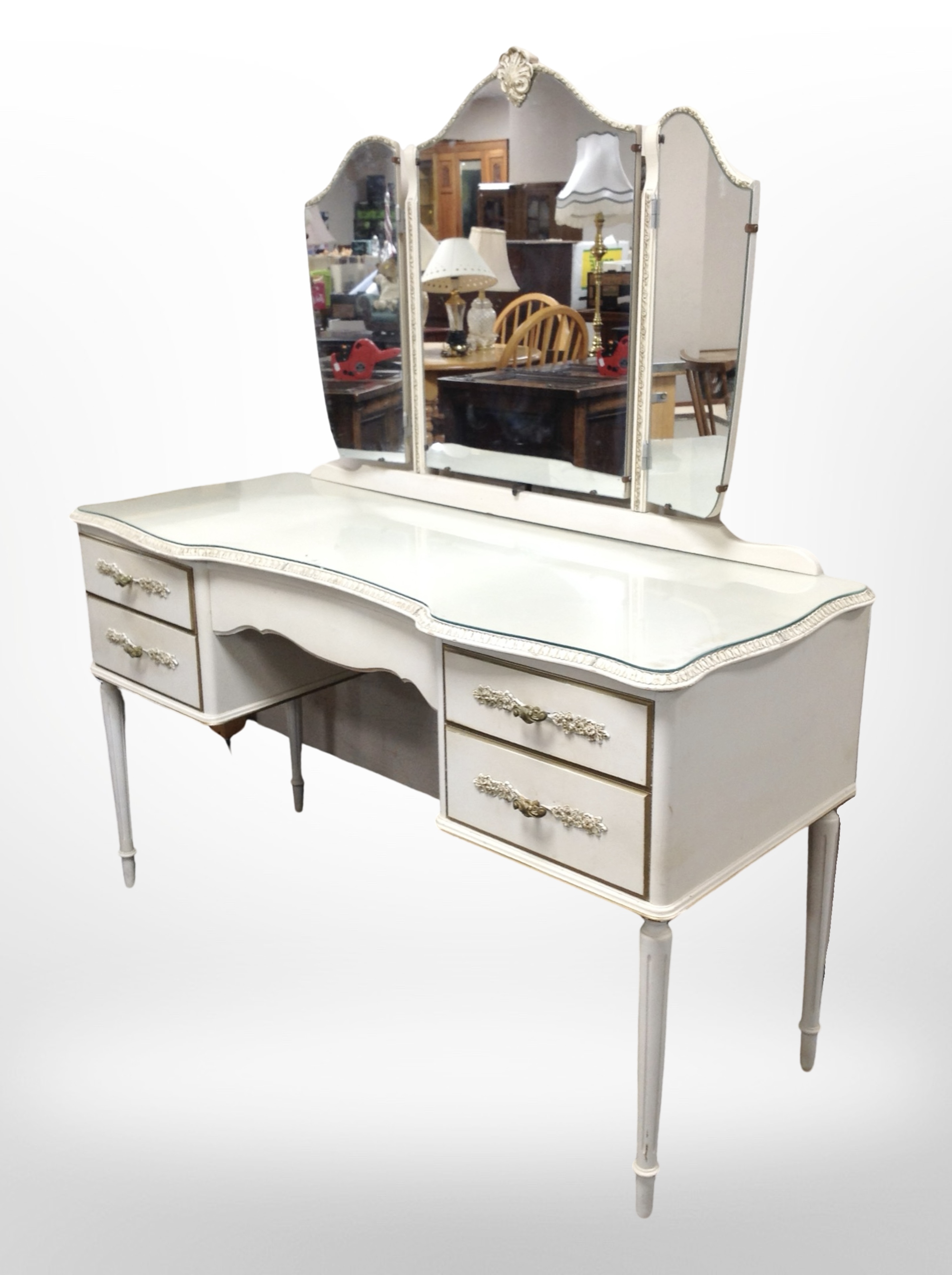 A French-style cream and gilt mirror-backed dressing table, 126cm wide x 49cm deep x 139cm high,