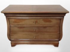 A reproduction mahogany chest of three drawers, 115cm wide x 52cm deep x 85cm high.