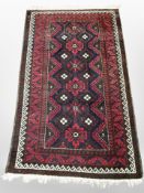 A Balouch rug, Afghanistan, 167cm x 97cm.