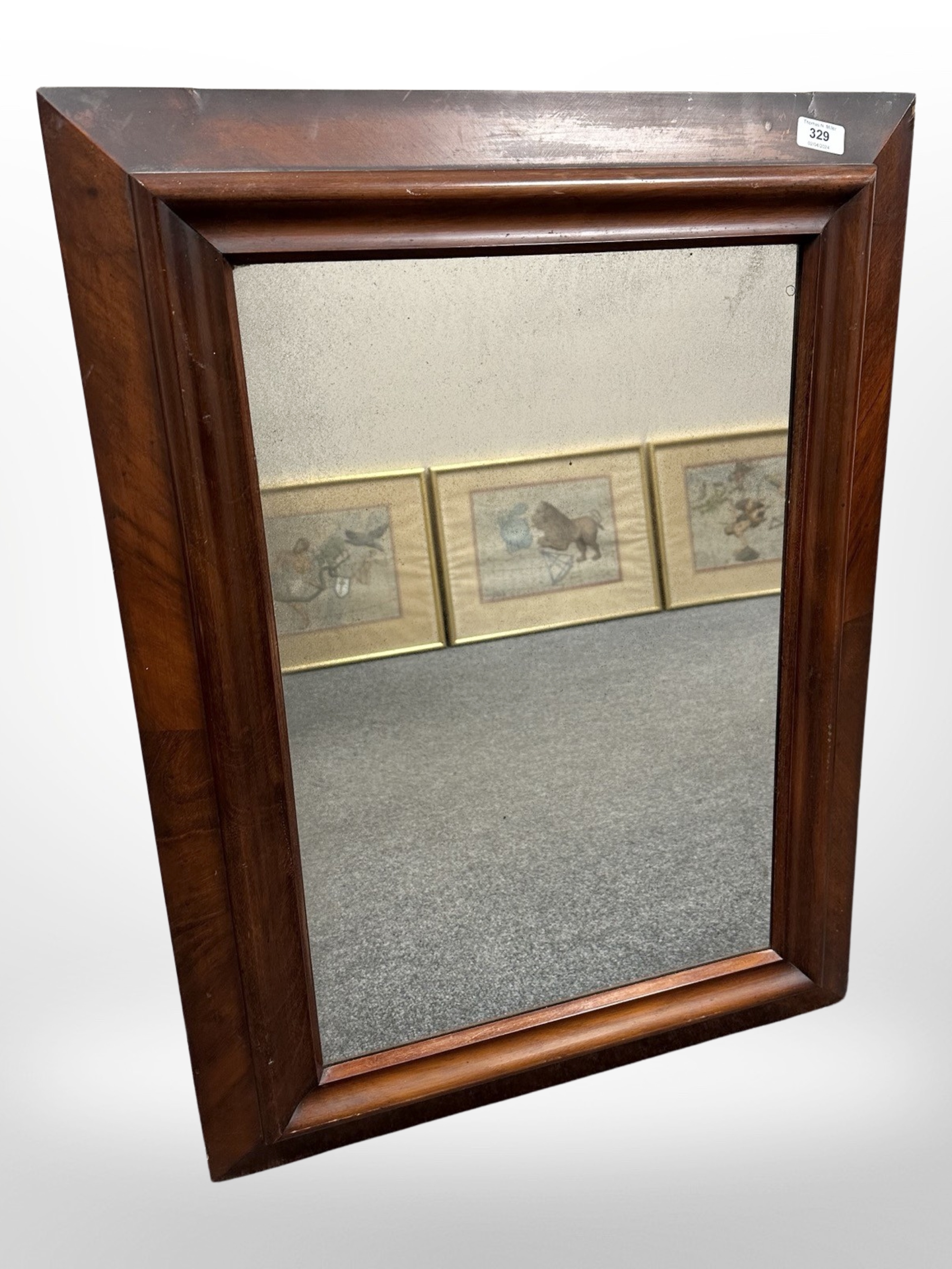 A 19th-century mahogany mirror, 61cm x 81cm.