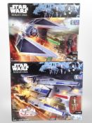 Two Hasbro Disney Star Wars Rogue One figures, Tie Striker and Rebel U-Wing Fighter, boxed.
