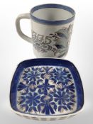 A Royal Copenhagen fajance mug, and a Danish square-shaped blue and white dish.