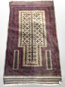 A Balouch prayer rug, Afghanistan, 130cm x 76cm.