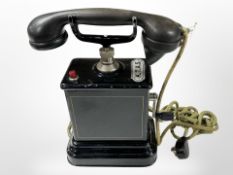 A mid-20th century continental wind-up telephone handset, height 30cm.