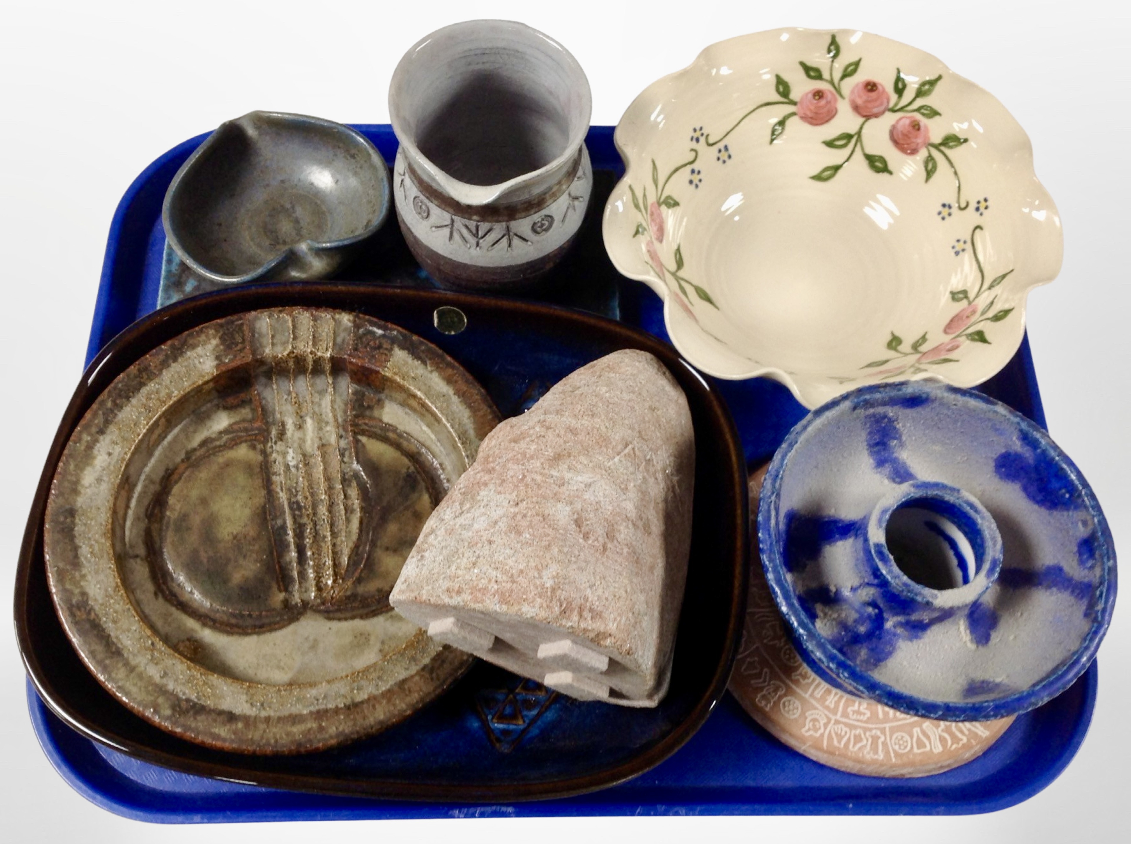 A group of Scandinavian studio pottery wares including bowls, jug, figural granite carving, etc.