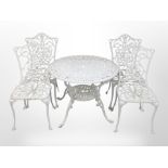 A painted cast-aluminium circular garden table, diameter 86cm, and a matching set of four chairs.