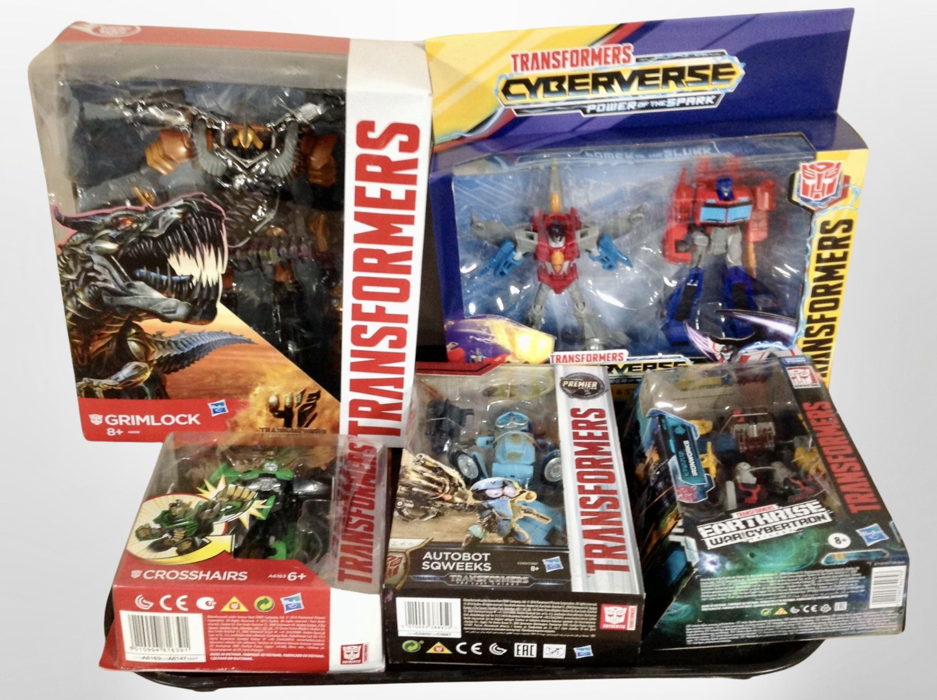 Five Hasbro Transformers figures, boxed.