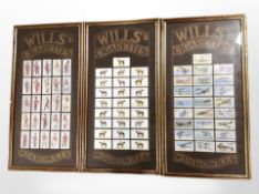 Three framed montages of Wills cigarette cards, each 60cm x 31cm overall.