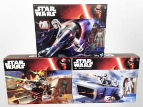 Three Hasbro Star Wars models, Slave I, Desert Landspeeder, and First Order Snowspeeder, boxed.