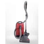 A Miele vacuum cleaner.