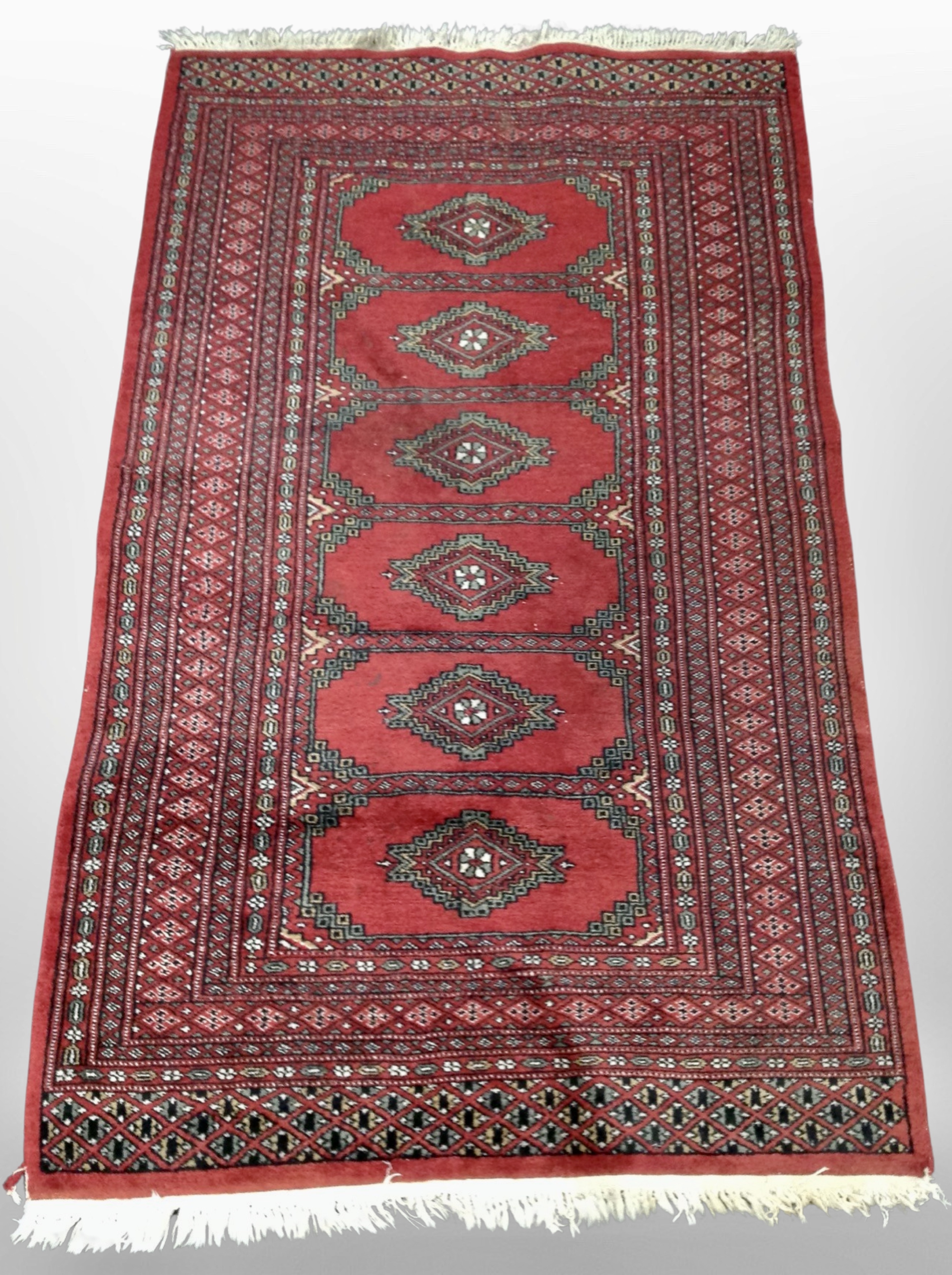 A Turkoman rug, Afghanistan, 167cm x 95cm.
