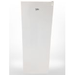 A Beko upright fridge.