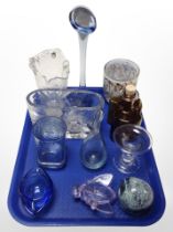 A group of Scandinavian glass paperweights, vases, amber glass bottle with cork stopper, etc.