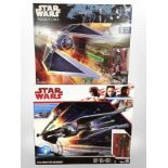 Two Hasbro Disney Star Wars figures, Tie Striker and Kylo Ren's Tie Silencer.