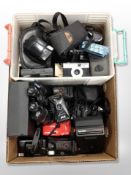 A box of vintage cameras including Olympus, Agfa,