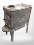 A Continental cast iron wood burning stove,