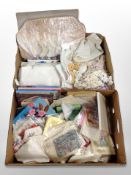 Two boxes of linen, lace doilies,