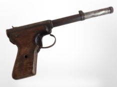 A vintage Diana model 2 air pistol.