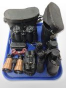 Six pairs of binolculars including pentax 12 x 50,