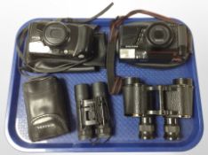 Two vintage cameras by Pentax and Fuji together with a pair of Miranda 10 x 25 binoculars and a