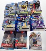 Nine Mattel and other figures including Max Steel, Voltron, etc.