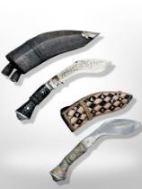 Two kukri knives, one in decorative embroidered sheath, longest 25cm.